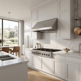 Modern kitchen with white cabinets, marble countertops, large window, ProlineRangeHoods.com 48" range + hood bundle.