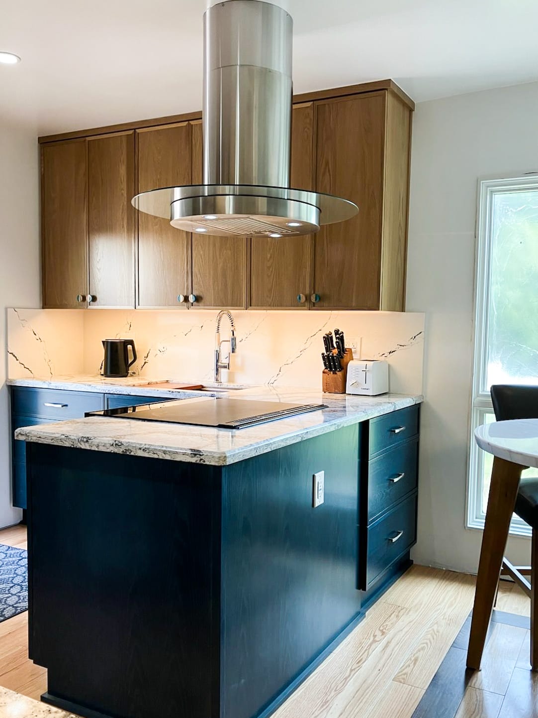 Brent's kitchen with a Proline island range hood