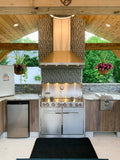 Experience the ultimate outdoor kitchen with ProlineRangeHoods.com, featuring a stainless grill and powerful Proline PLJW 129 Hood.