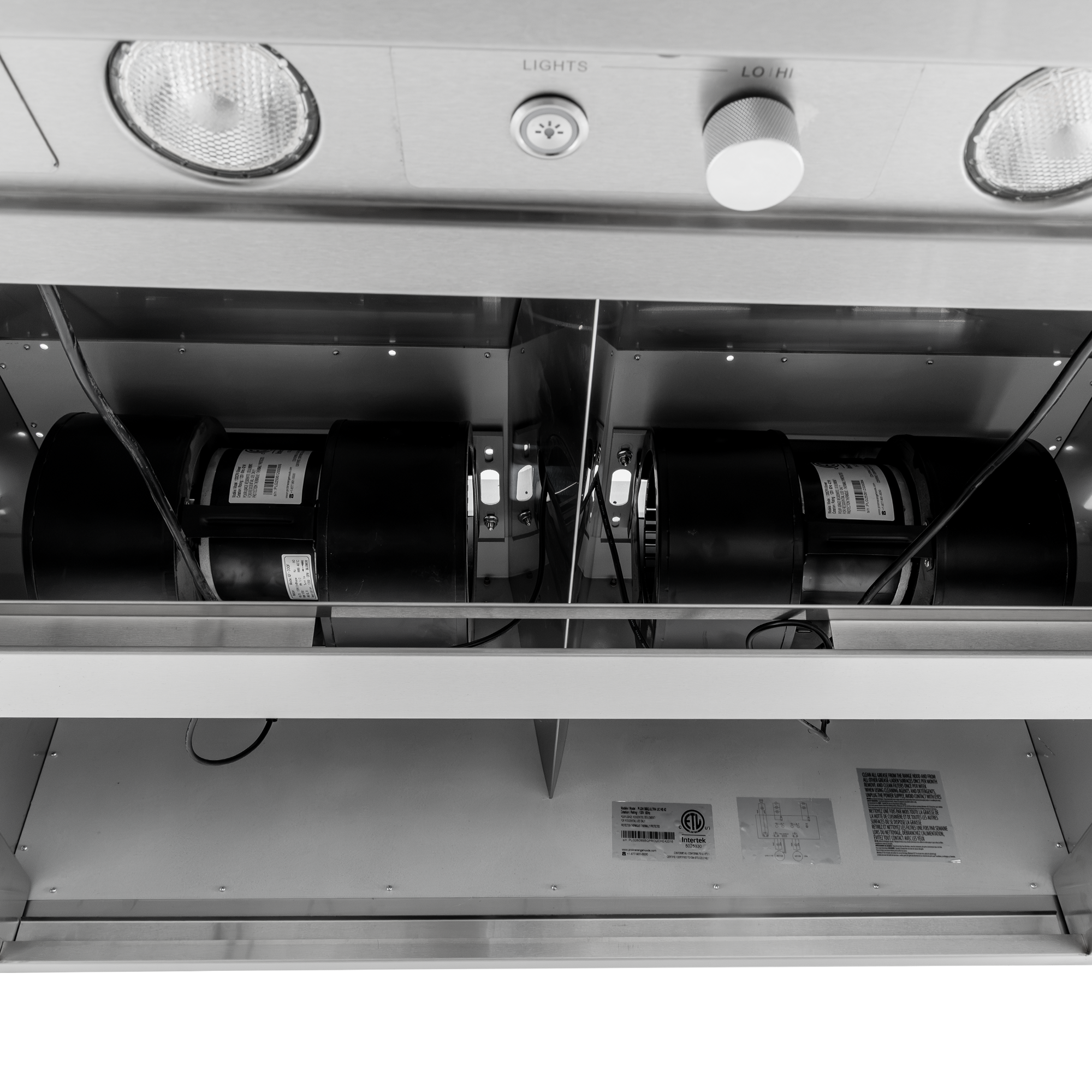 Underside of a PLGW BBQ ULTRA UC HE range hood with dual blowers, lights, and knobs. ProlineRangeHoods.com.