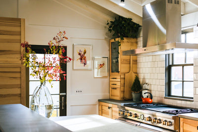 Customer kitchen with the Proline PLFW 750 - Ducted Wall-Mounted Range Hood, 900/1100 CFM | Stainless Steel Finish