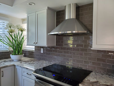 Customer kitchen with the Proline Vector - Ducted Wall-Mounted Range Hood, 600 CFM | Stainless Steel Finish
