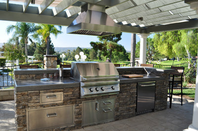 Customer kitchen with the Proline PLJI 103 - Ducted Island Range Hood, 1200 CFM | Stainless Steel Finish, Outdoor Rated Finish Option