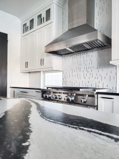 Customer kitchen with the Proline PLJW 104 - Wall-Mounted Range Hood, 1200 CFM | Stainless Steel, Outdoor Rated Finish Option