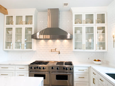 Customer kitchen with the Proline PLJW 104 - Wall-Mounted Range Hood, 1200 CFM | Stainless Steel, Outdoor Rated Finish Option