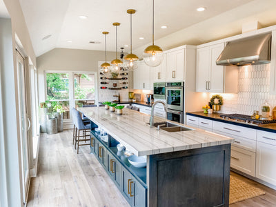Customer kitchen with the Proline PLJW 109 - Wall-Mounted Range Hood, 1000/2000 CFM | Convertible to Ductless, Stainless Steel Finish, Outdoor Rated
