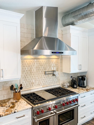 Customer kitchen with the Proline PLJW 130 - Ducted Wall-Mounted Range Hood, 900/1200 CFM | Stainless Steel Finish