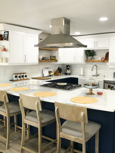 Customer kitchen with the Proline PLFI 520 - Ducted Island Range Hood, 600/1100 CFM | Stainless Steel Finish