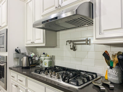 Customer kitchen with the Proline PLJW 117 - Under-Cabinet Range Hood, 900 CFM Stainless Steel Finish