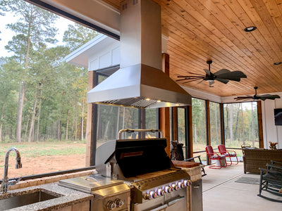 Customer kitchen with the Proline PLJI 103 - Ducted Island Range Hood, 1200 CFM | Stainless Steel Finish, Outdoor Rated Finish Option