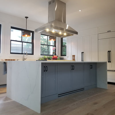 Customer kitchen with the Proline ProSI Ducted Island Range Hood, 900/1800 CFM | 430/304 Stainless Steel Finish