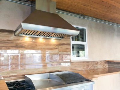 Customer kitchen with the Proline PLJW 109 WC - Ducted Wall-Mounted Range Hood, 1200 CFM | Stainless Steel Finish, Outdoor Rated