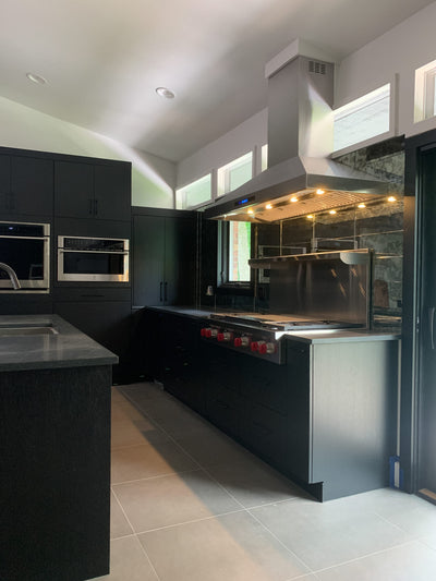 Customer kitchen with the Proline ProSW - Professional Wall-Mounted Range Hood, 1800 CFM | LED Lighting, Stainless Steel Finish