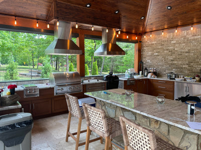 Customer kitchen with the Proline PLJI 103 - Ducted Island Range Hood, 1200 CFM | Stainless Steel Finish, Outdoor Rated Finish Option