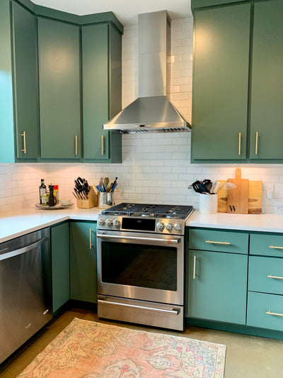 Customer kitchen with the Proline PLFW 129 J - Wall-Mounted Vent Hood, 900 CFM | Stainless Steel