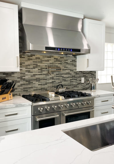 Customer kitchen with the Proline PLJW 101 - Ducted Under-Cabinet Range Hood, 1000/2000 CFM | Stainless Steel Finish