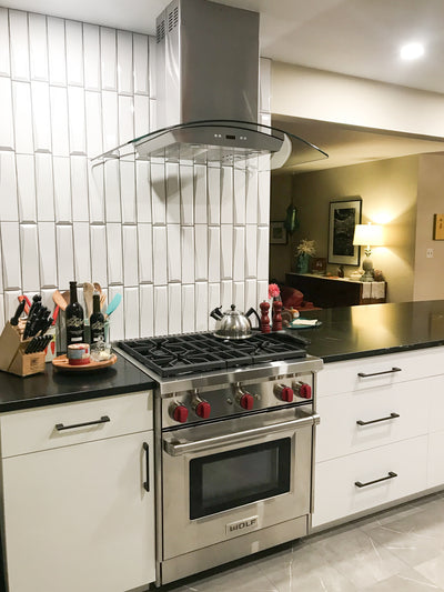 Customer kitchen with the Proline PLFI 544 - Ducted Island Range Hood, 600 CFM | Stainless Steel Finish