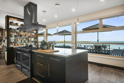 Customer kitchen with the Proline PLFI 750 - Island Range Hood, 1100 CFM | Stainless Steel Finish