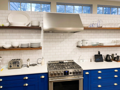 Customer kitchen with the Proline PLJW 109 - Wall-Mounted Range Hood, 1000/2000 CFM | Convertible to Ductless, Stainless Steel Finish, Outdoor Rated