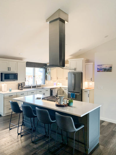 Customer kitchen with the Proline PLFI 544 - Ducted Island Range Hood, 600 CFM | Stainless Steel Finish