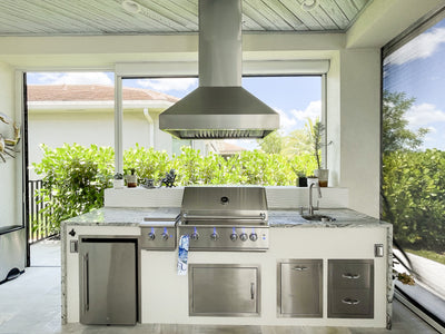 Customer kitchen with the Proline PLJI 103 - Ducted Island Range Hood, 1200 CFM | Stainless Steel Finish, Outdoor Rated Finish Option