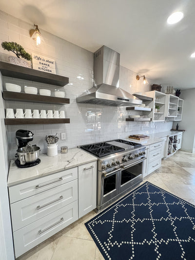 Customer kitchen with the Proline ProSW - Professional Wall-Mounted Range Hood, 1800 CFM | LED Lighting, Stainless Steel Finish
