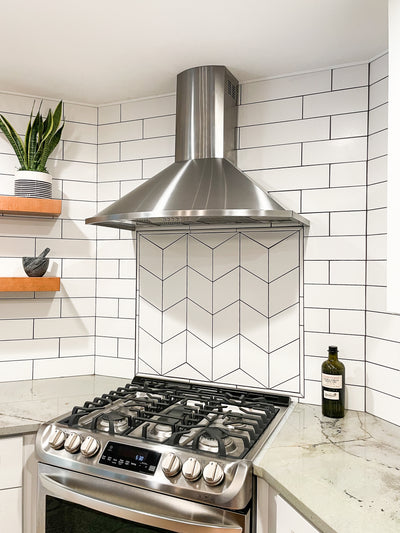 Customer kitchen with the Proline Vector - Ducted Wall-Mounted Range Hood, 600 CFM | Stainless Steel Finish