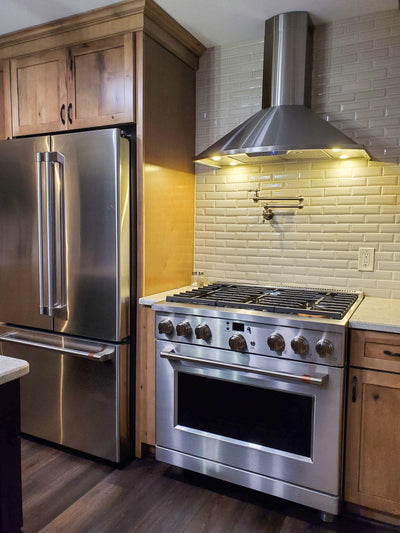 Customer kitchen with the Proline Vector - Ducted Wall-Mounted Range Hood, 600 CFM | Stainless Steel Finish