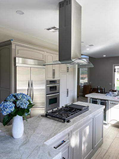 Customer kitchen with the Proline PLFI 544 - Ducted Island Range Hood, 600 CFM | Stainless Steel Finish