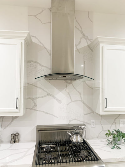 Customer kitchen with the Proline PLFW 544 - Wall-Mounted Range Hood, 600 CFM | Convertible to Ductless, Stainless Steel Finish