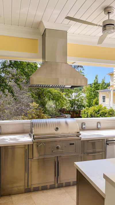 Customer kitchen with the Proline PLJI 103 - Ducted Island Range Hood, 1200 CFM | Stainless Steel Finish, Outdoor Rated Finish Option