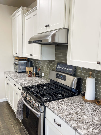 Customer kitchen with the Proline PLJW 117 - Under-Cabinet Range Hood, 900 CFM Stainless Steel Finish