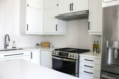 Customer kitchen with the Proline PLJW 185 - Slim Under-Cabinet Range Hood, 600 CFM | Convertible to Ductless, Stainless Steel