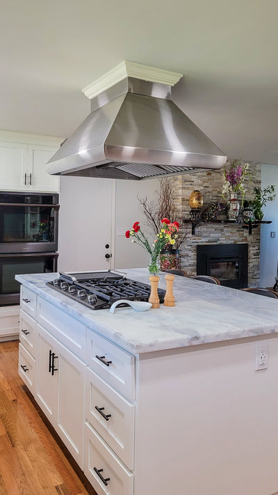Customer kitchen with the Proline PLJI 109 - Ducted Island Range Hood, 1200 CFM | Stainless Steel Finish