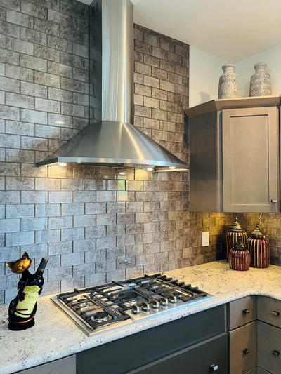 Customer kitchen with the Proline Vector - Ducted Wall-Mounted Range Hood, 600 CFM | Stainless Steel Finish