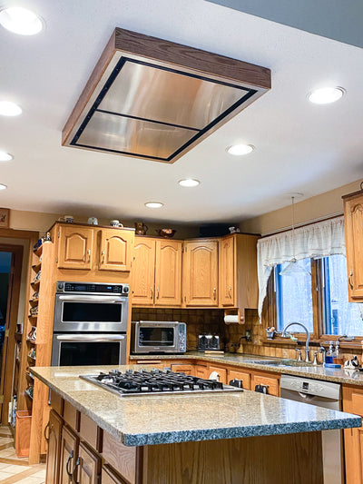 Customer kitchen with the Proline PLFI - 42-Inch Ceiling Flush Mount Range Hood, 1200 CFM | Stainless Steel Finish