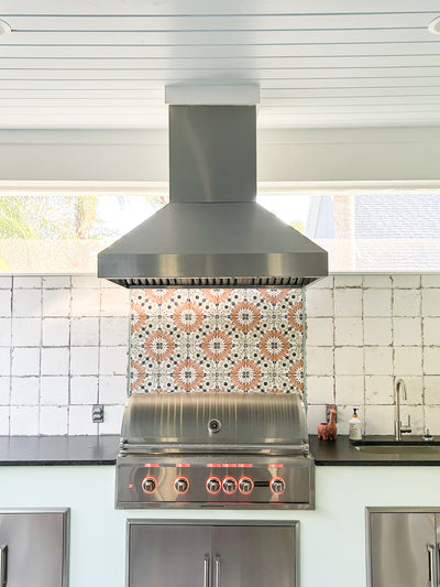 Customer kitchen with the Proline PLJI 103 - Ducted Island Range Hood, 1200 CFM | Stainless Steel Finish, Outdoor Rated Finish Option