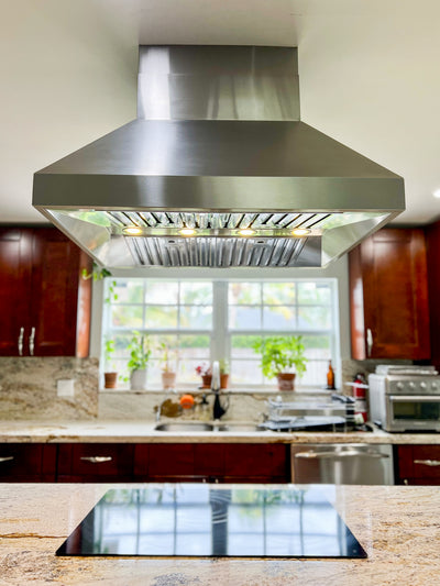 Customer kitchen with the Proline ProSI Ducted Island Range Hood, 900/1800 CFM | 430/304 Stainless Steel Finish