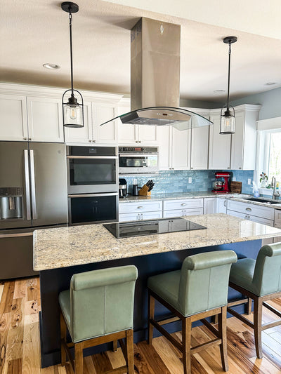 Customer kitchen with the Proline PLFI 544 - Ducted Island Range Hood, 600 CFM | Stainless Steel Finish