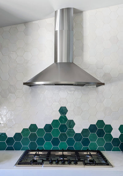 Customer kitchen with the Proline Vector - Ducted Wall-Mounted Range Hood, 600 CFM | Stainless Steel Finish