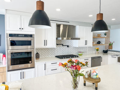 Customer kitchen with the Proline PLFI 750 - Island Range Hood, 1100 CFM | Stainless Steel Finish