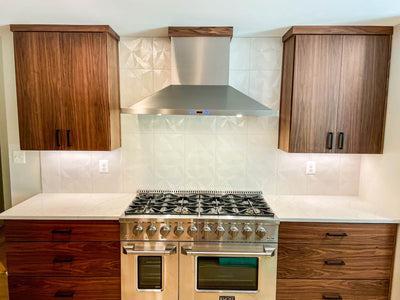 Customer kitchen with the Proline PLFW 520 - Wall-Mounted Range Hood, 600/1200 CFM | Convertible to Ductless, Stainless Steel, Matte Black Finish