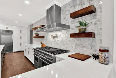 Customer kitchen with the Proline PLFW 755 - Ducted Wall-Mounted Range Hood, 1100 CFM | Stainless Steel, Outdoor Rated Finish Option