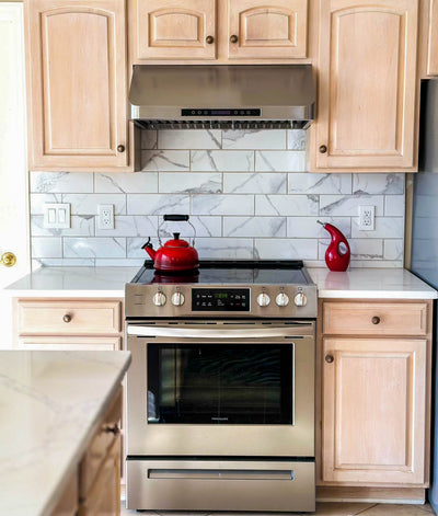 Customer kitchen with the Proline PLJW 113 - Under Cabinet Vent Hood, 900 CFM | Convertible to Ductless, Stainless Steel with Modern Control Panel