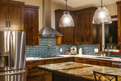 Customer kitchen with the Proline PLFW 129 E - Wall-Mounted Range Hood, 900 CFM | Stainless Steel Design