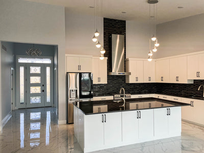 Customer kitchen with the Proline PLFW 755 - Ducted Wall-Mounted Range Hood, 1100 CFM | Stainless Steel, Outdoor Rated Finish Option