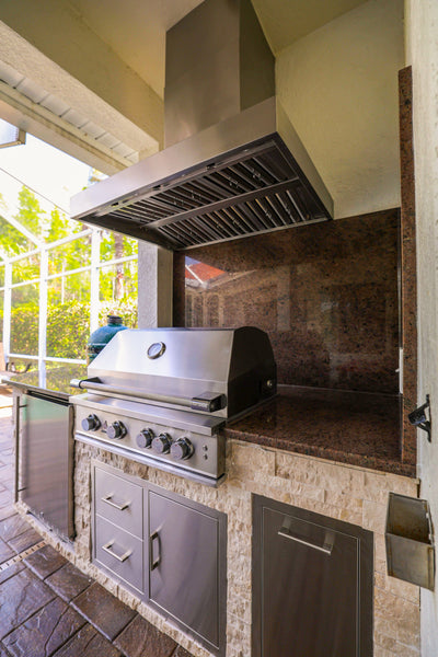 Customer kitchen with the Wall Mounted Range hood, Ducted, 2000 CFM, Thick 304 Stainless Steel | PLGW WC BBQ Ultra