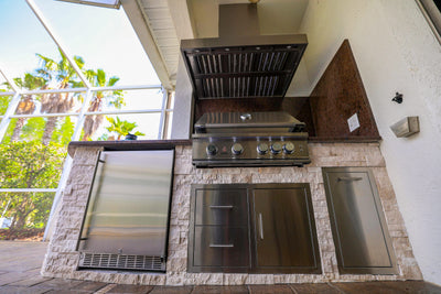 Customer kitchen with the Wall Mounted Range hood, Ducted, 2000 CFM, Thick 304 Stainless Steel | PLGW WC BBQ Ultra