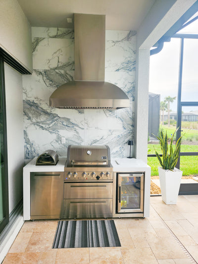 Customer kitchen with the Wall Mounted Range hood, Ducted, 2000 CFM, Thick 304 Stainless Steel | PLGW WC BBQ Pro