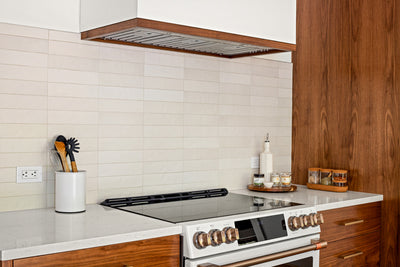 Customer kitchen with the Proline UMOD INS - Custom Insert Range Hood, 600 CFM | Stainless Steel Finish